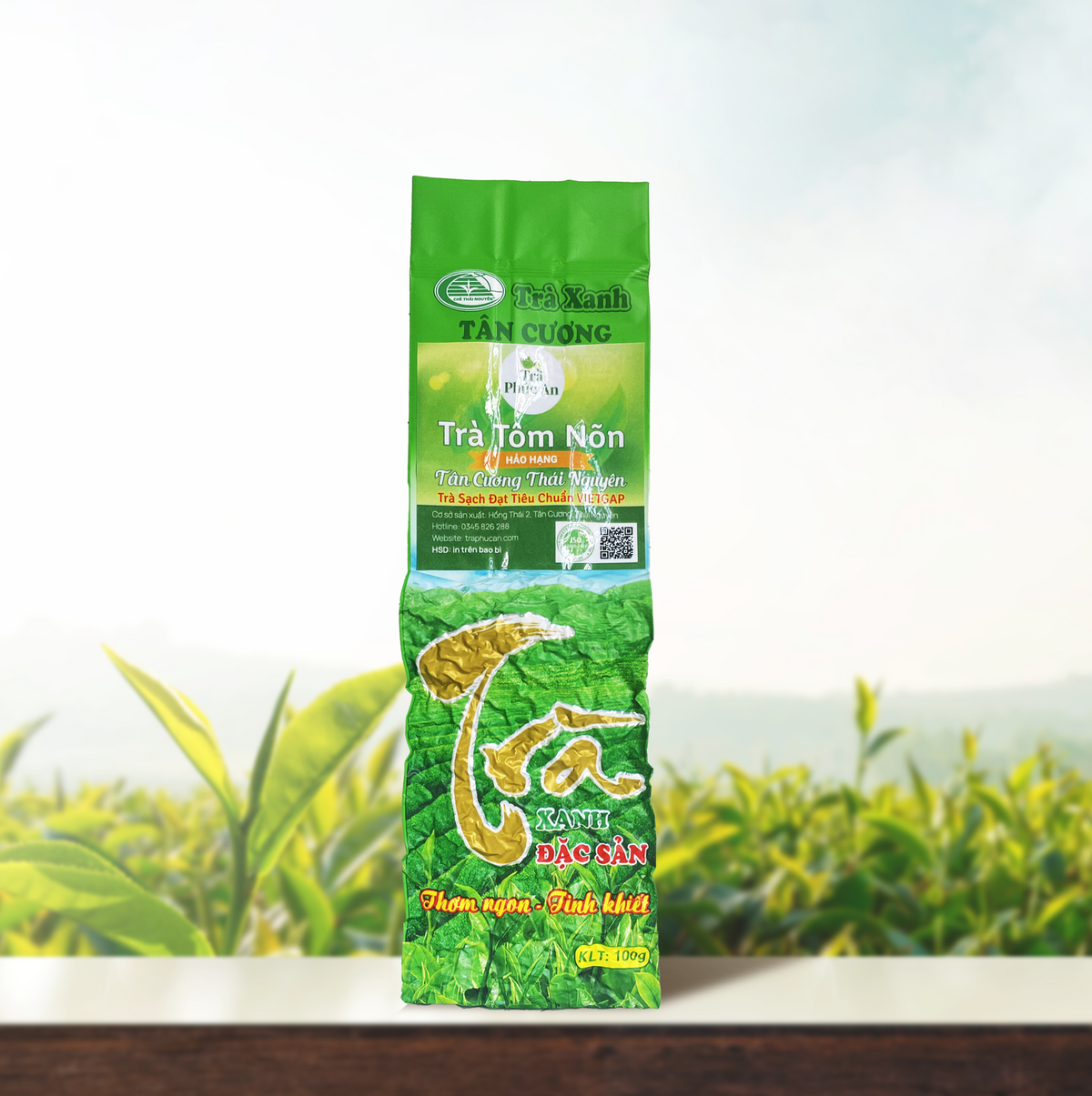 Gói Trà Tôm Nõn Hảo Hạng 100g màu xanh lá, nhãn Phúc An và chữ Trà màu vàng.
